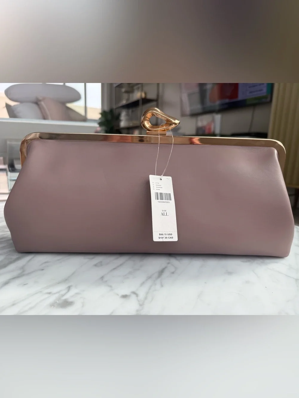 Soft pink clutch, NWT.